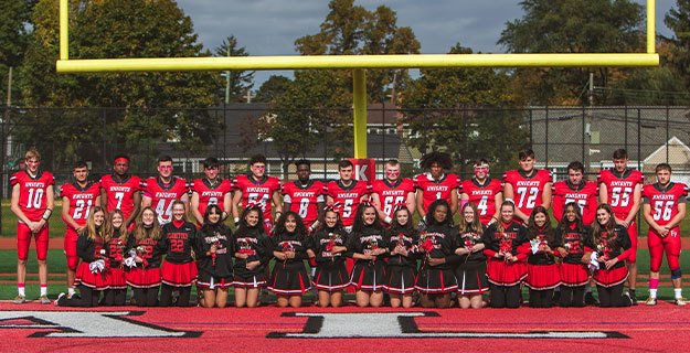 Senior Football Players, Cheerleaders, and Florettes Group Photo