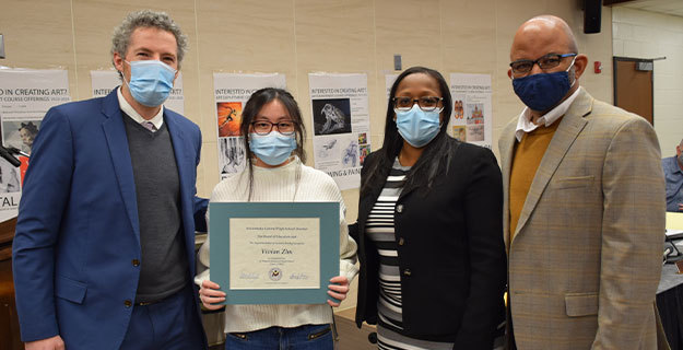 Elmont Memorial High School valedictorian Vivian Zhu and BOE Members