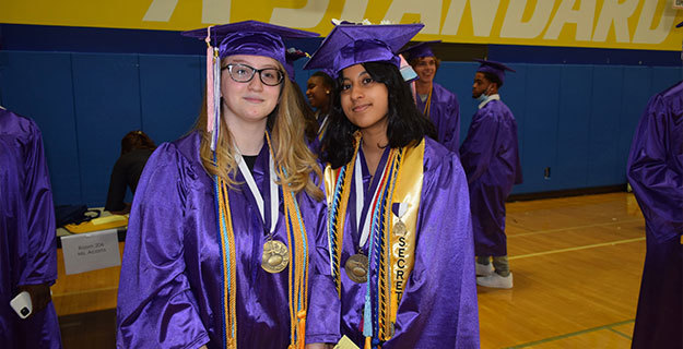 SHS Students Wearing Cap and Gowns