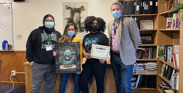 Elmont Memorial High School senior Tierra Thomas and Staff Members
