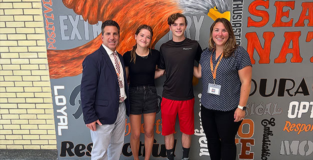 Kate Marcino, Vaughn Sheehan, and two others
