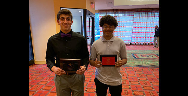 Alec Guglielmo and sophomore Jayden Estevez holding their awards