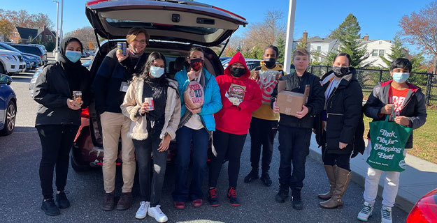 Students Holding Donated Food