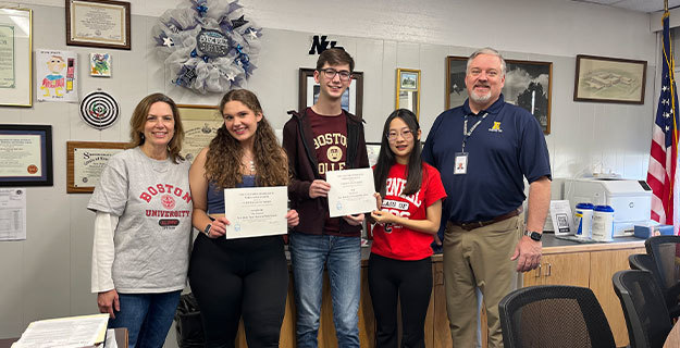 Editors-in-Chief Hannah Kim and  Gregory Marzano, Anna Detke, and others