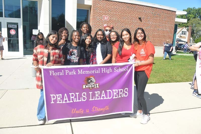 Students holding "Pearls Leaders" Banner