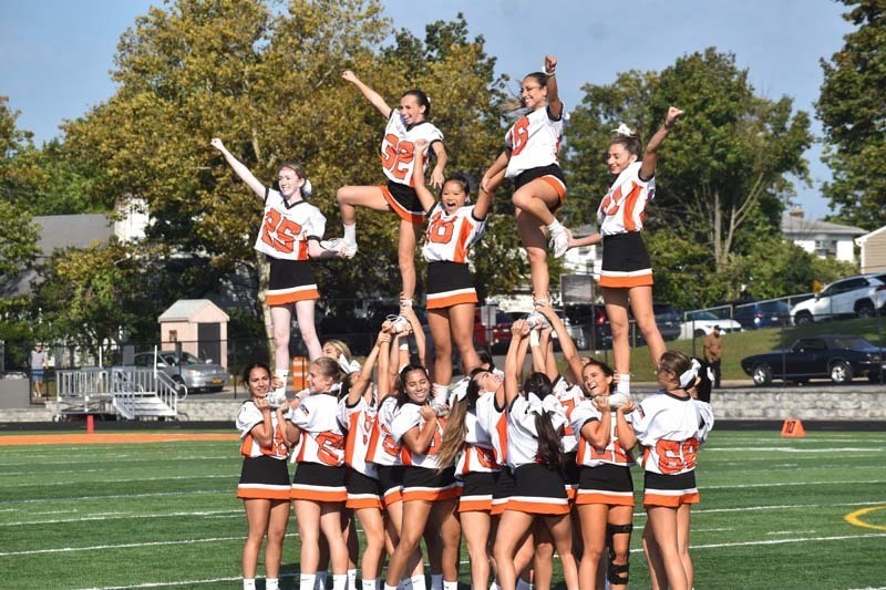 Cheerleaders Perform on Field