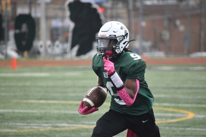 Elmont Memorial HS Football Player Running With Ball