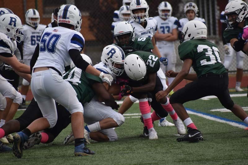 Elmont Memorial HS Football Players in Action