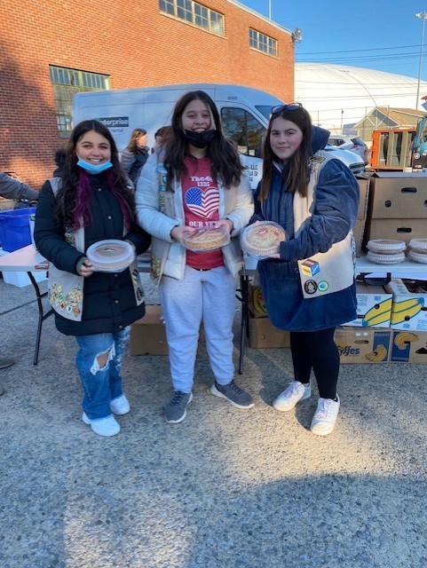 Students Holding Food Donations