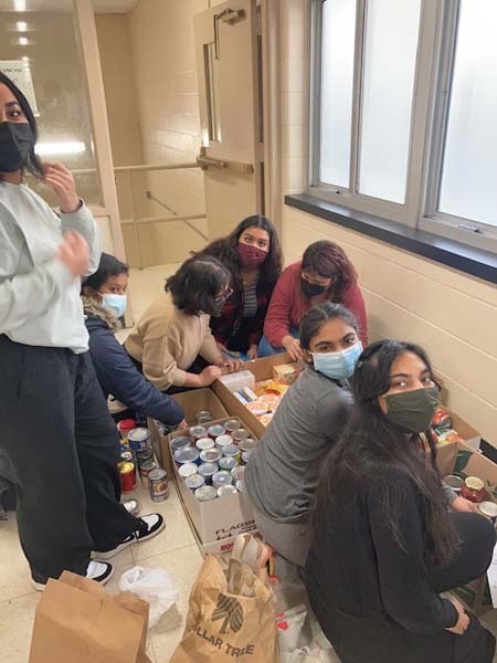 Students With Canned Goods