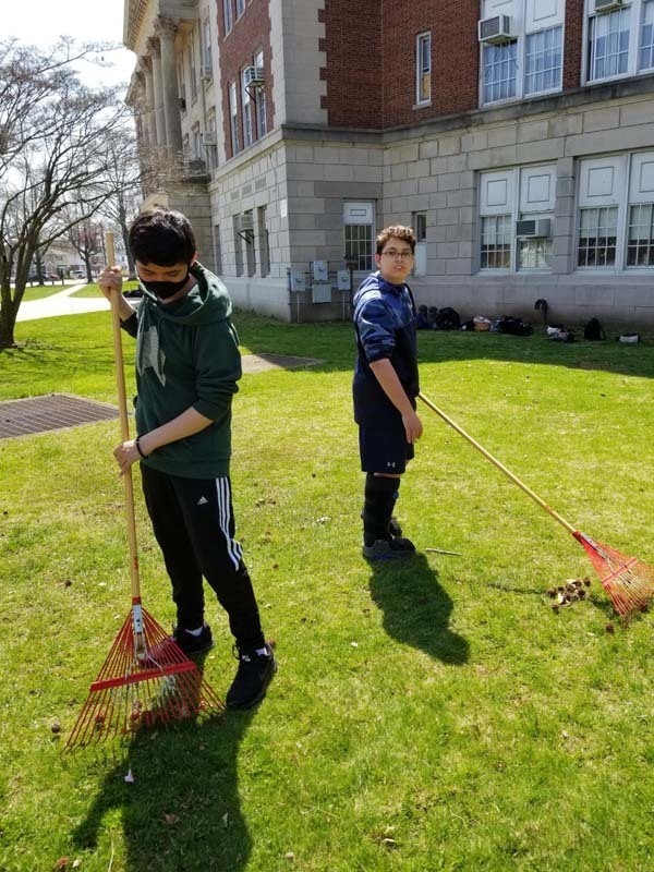 Students work outside for Earth Day