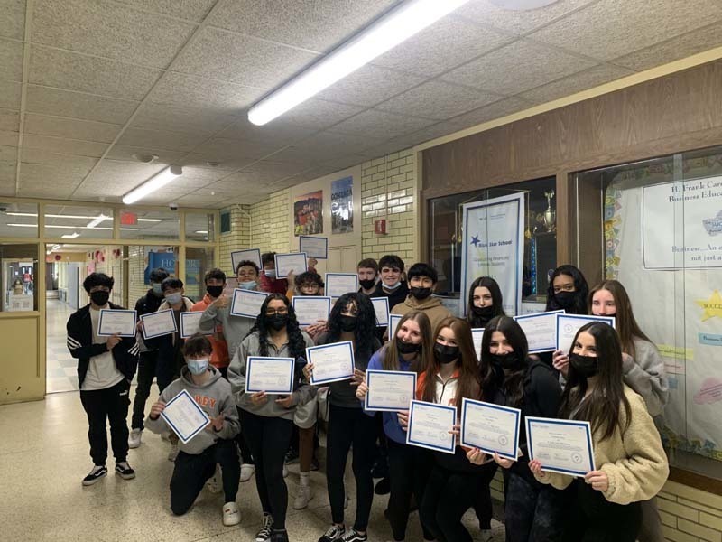 H. Frank Carey High School Students holding certificates