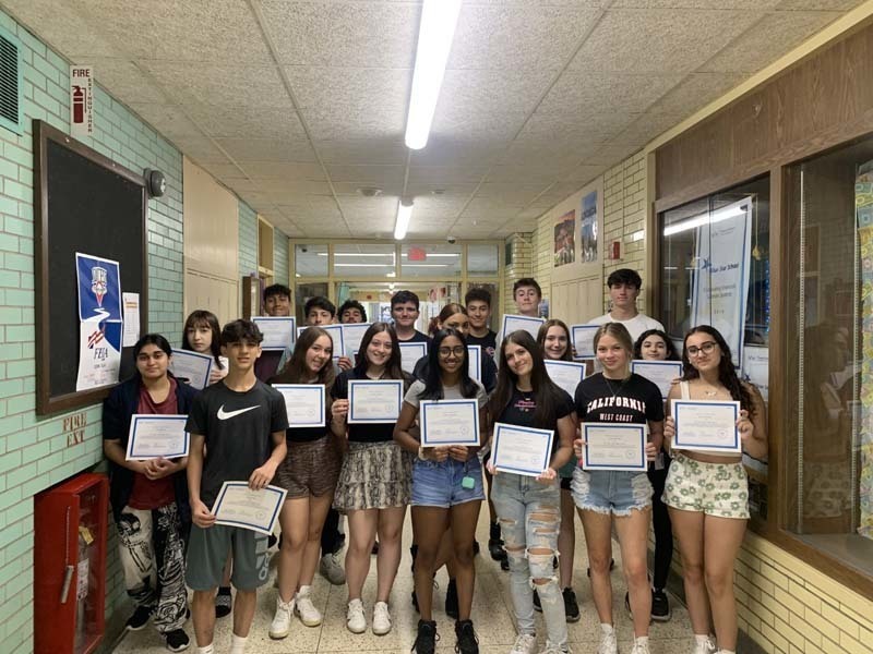 H. Frank Carey High School Students holding certificates
