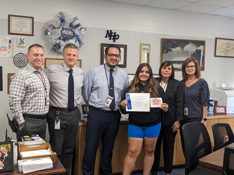 New Hyde Park Memorial High School student Michelle Galeano with staff